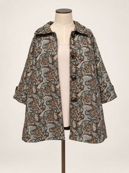 Taupe &amp; Teal Brocade Jacket a short-sleeved button-front coat with an intricate brown, beige, and gray paisley pattern.