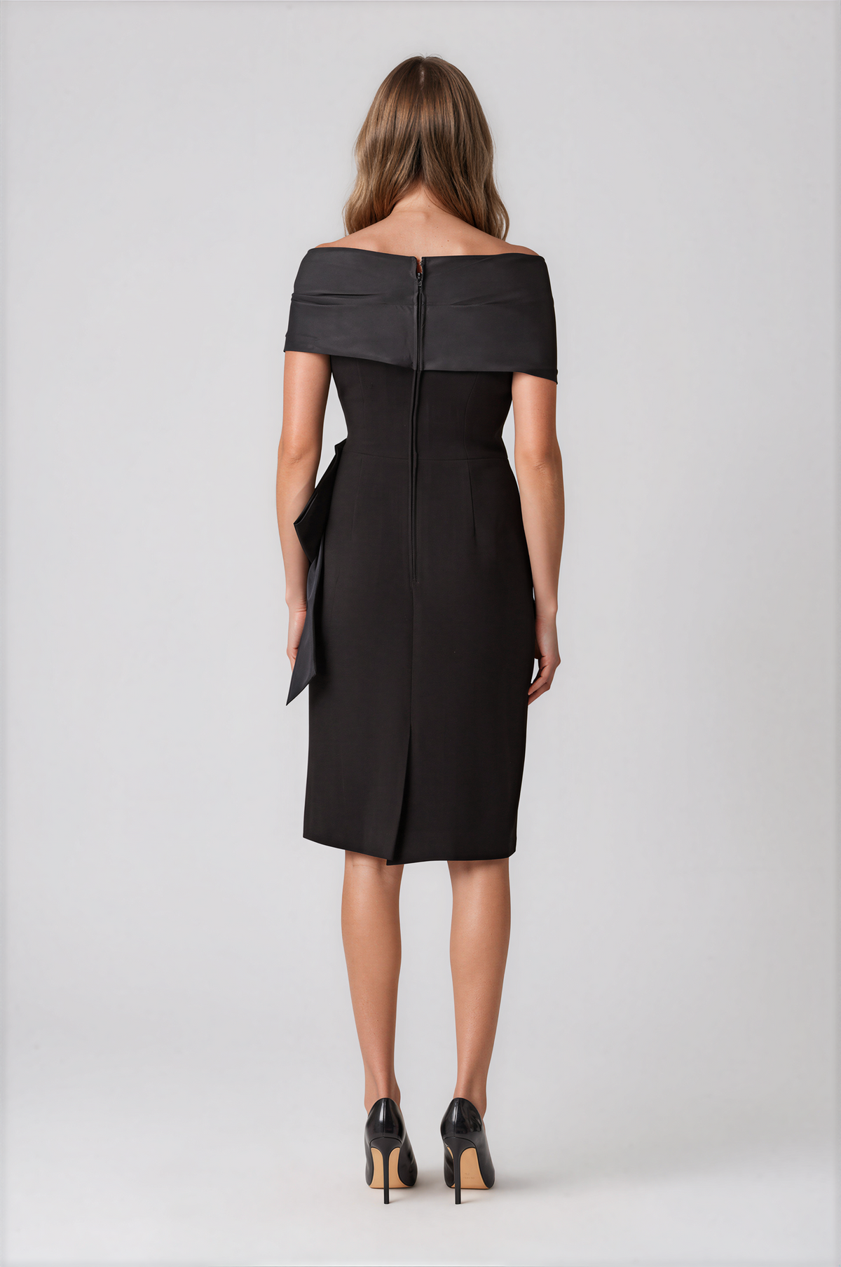 Teri Jon 267226BLK-0 Taffeta and Crepe Bow Sheath Dress black off-the-shoulder midi dress with a large draped waist bow.