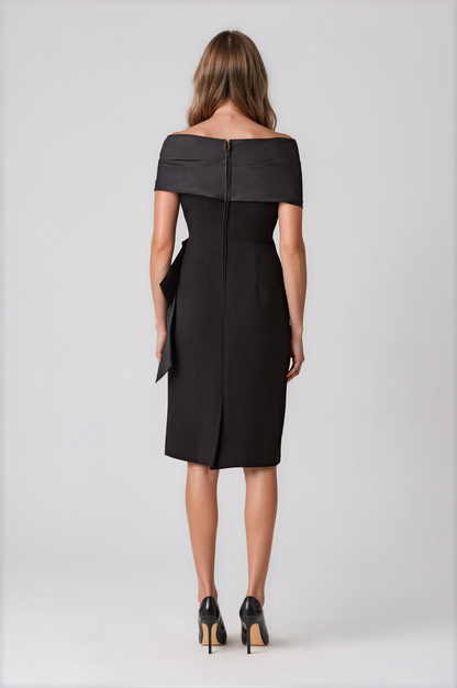 Teri Jon 267226BLK-0 Taffeta and Crepe Bow Sheath Dress black off-the-shoulder midi dress with a large draped waist bow.