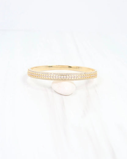 Gold bracelet with lined in cz