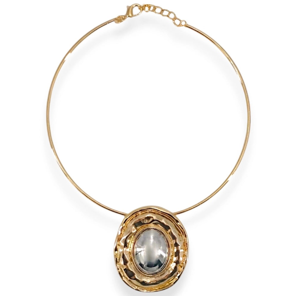 Gold necklace with a pendant on a white background