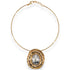 Gold necklace with a pendant on a white background