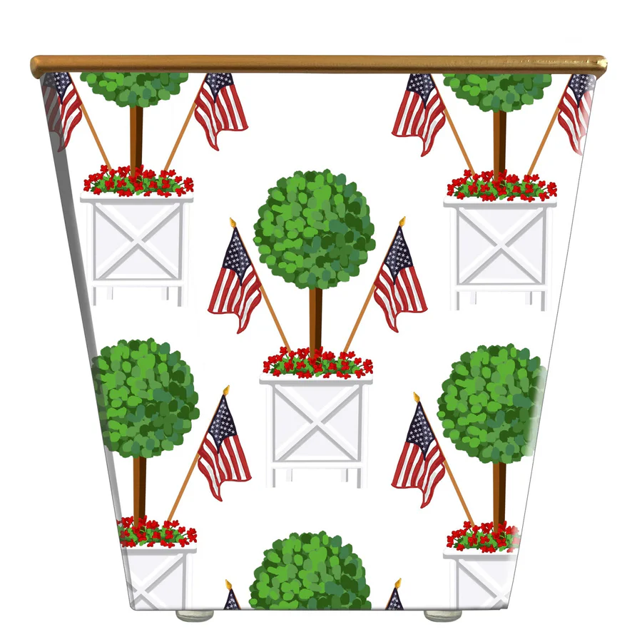 WHH Patriotic Topiary Cachepot Candle Orange and Clove Scent decorative design with potted plants, American flags, and white boxes