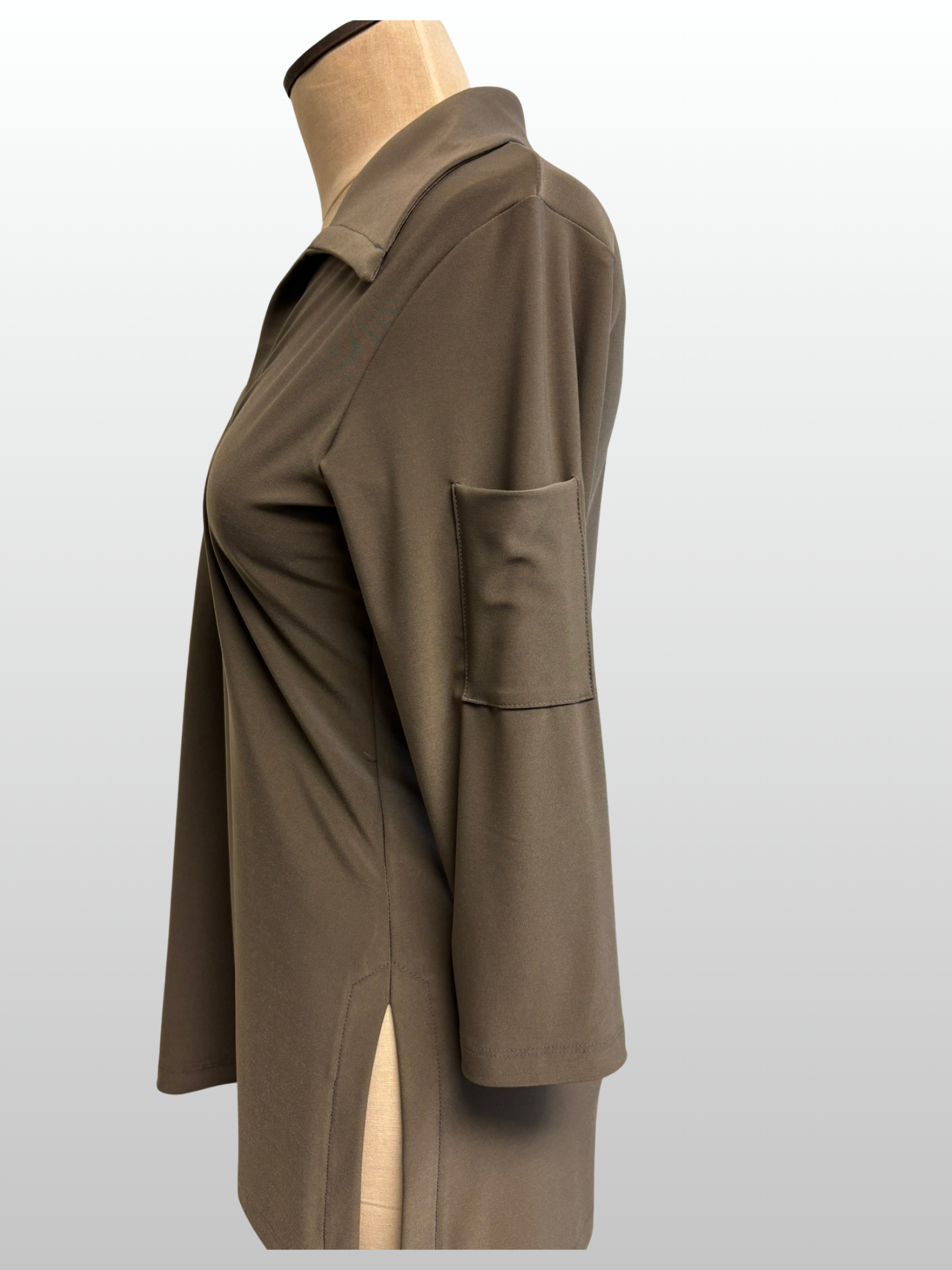 Brown jacket on a mannequin against a white background