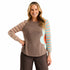 A woman modeling a long-sleeve crewneck top with a solid brown body, peach and turquoise striped sleeves, and a large light blue and coral abstract flower on the right side Zaket & Plover Walnut Bright Side Sweater