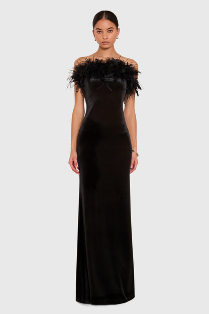 The Amanda Uprichard Ella Gown in black, a rich plush velvet. Strapless and finished with an ostrich feather trim at the neckline.