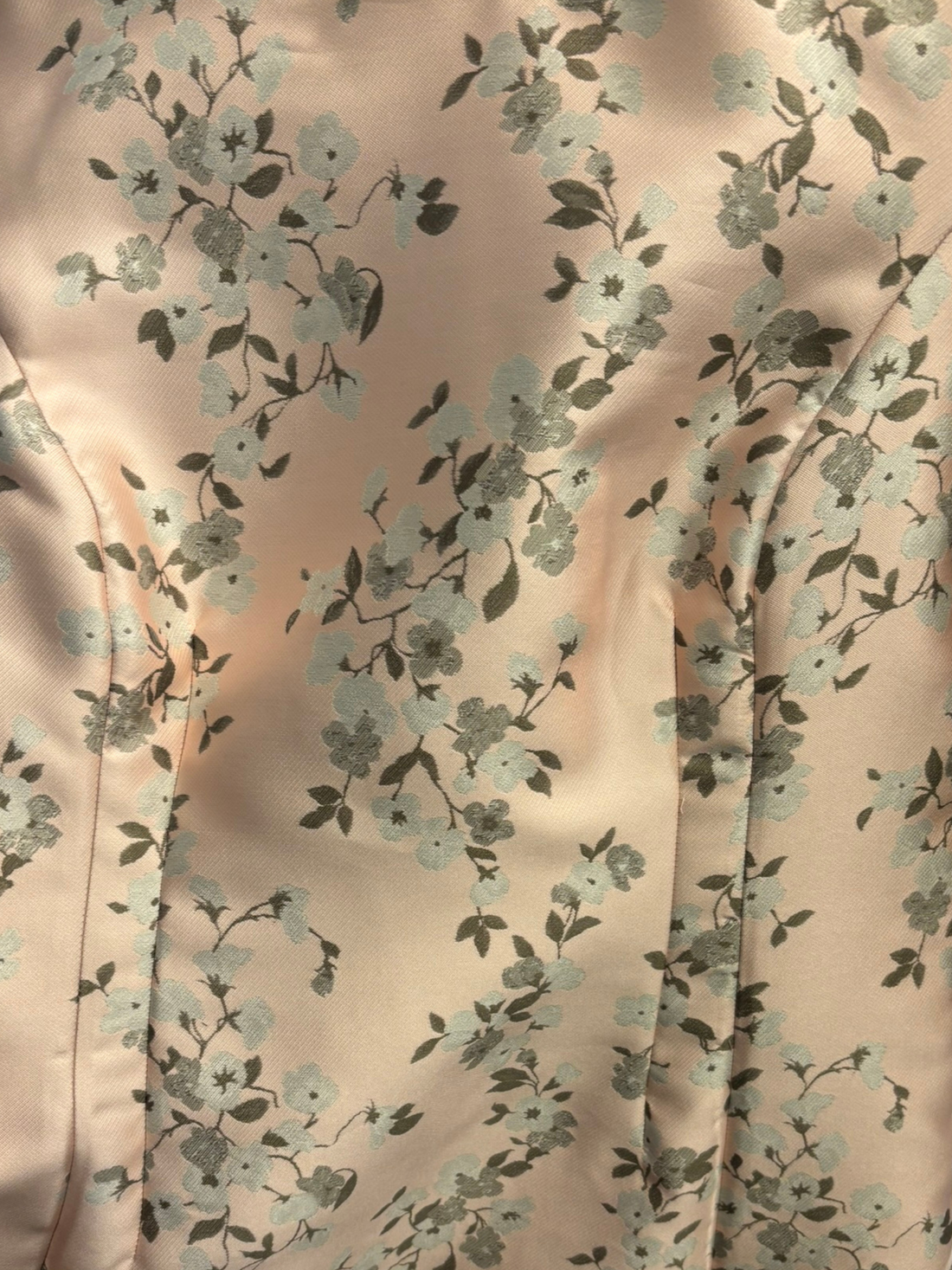 Floral pattern on a fabric with a soft pink background