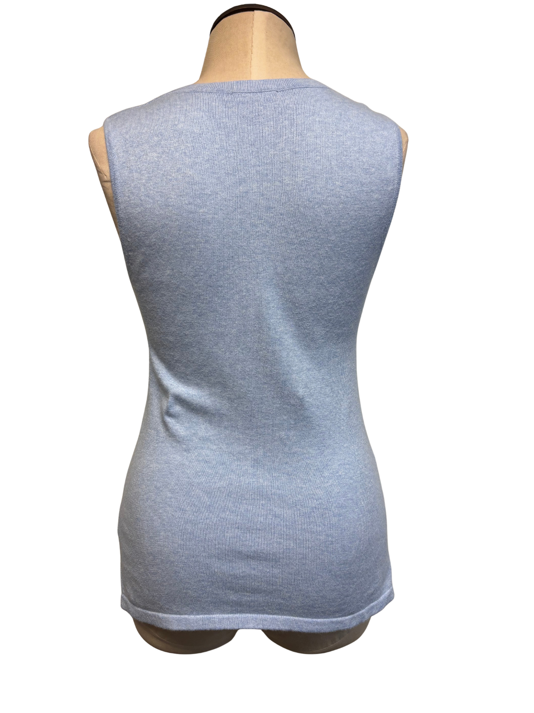 Blue sleeveless top on a mannequin against a white background