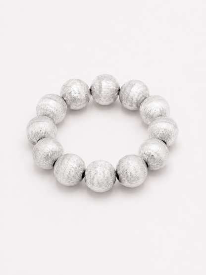 A beaded stretch bracelet made of glossy, round brushed silver beads. Uga, georgia football, university of Georgia game day jewelry. 