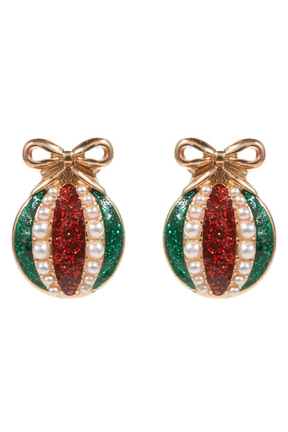 Pair of christmas earrings with red, green, and pearl design on a white background
