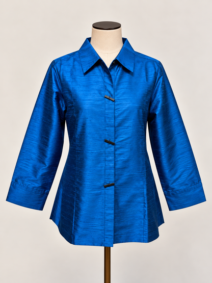 A bright blue silk textured long-sleeve blouse 
