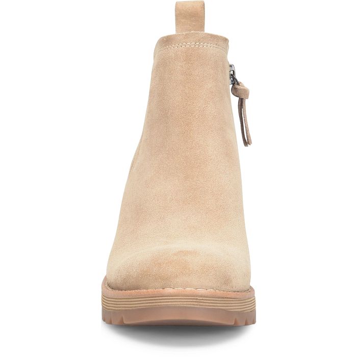 Beige ankle boot with a zipper on a white background