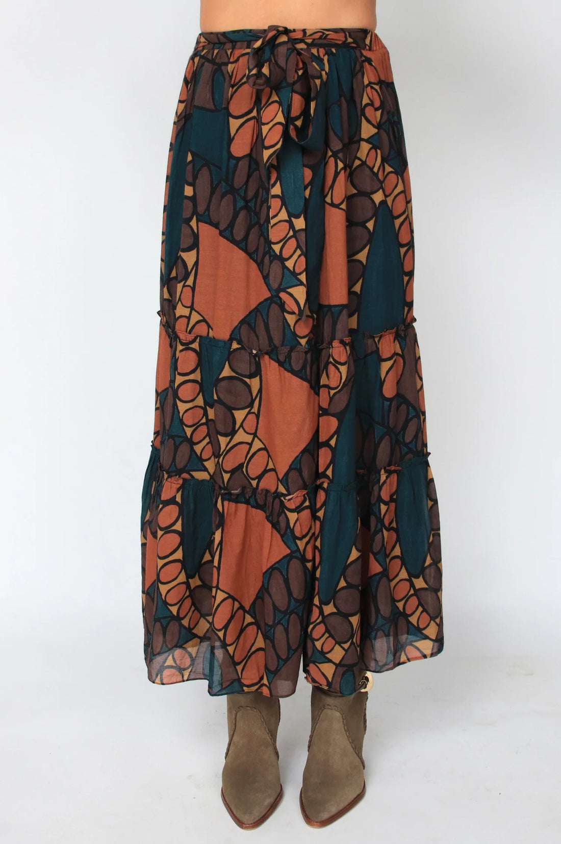 Long, patterned skirt with a white background