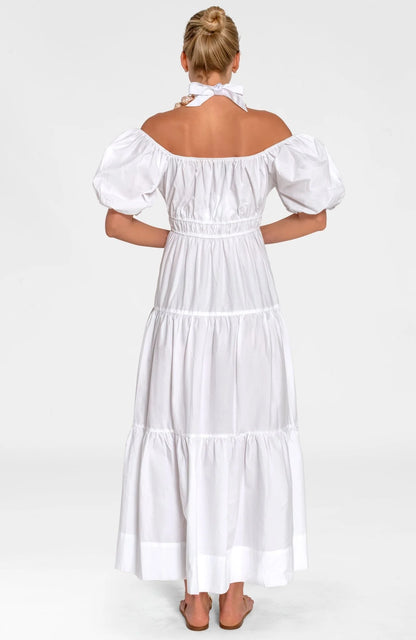 Woman wearing a white dress on a white background