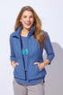 Woman wearing a blue quilted vest against a white background