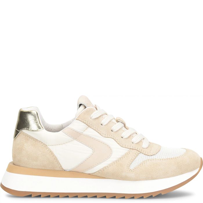 Beige and white sneaker with a brown sole on a white background
