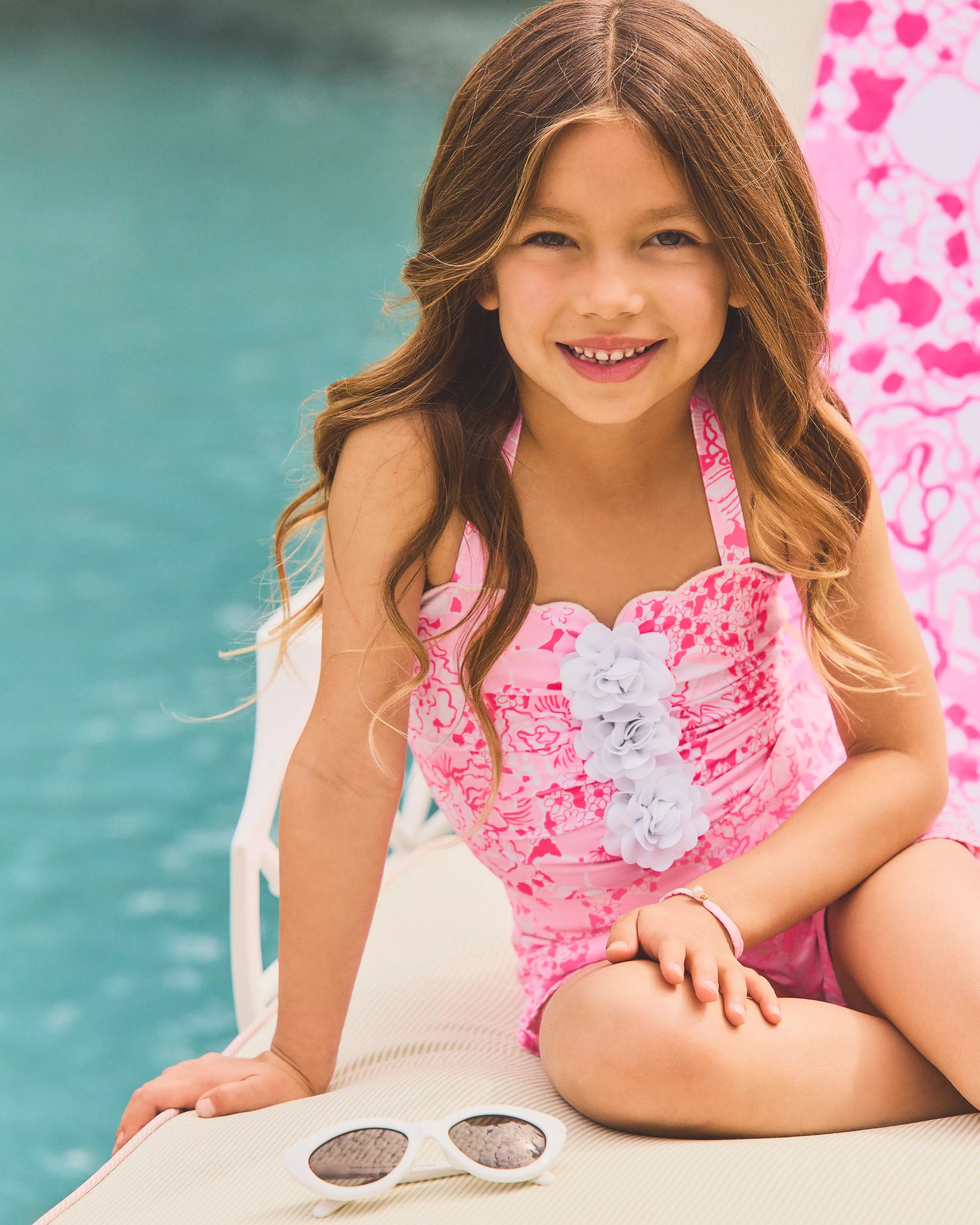 Young girl Lilly Pulitzer x Janie and Jack Girls Maddie Flower Swimsuit pink floral swimsuit 