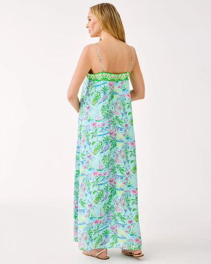 Woman wearing a floral dress on a white background