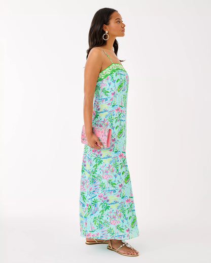 Woman wearing a floral dress on a white background