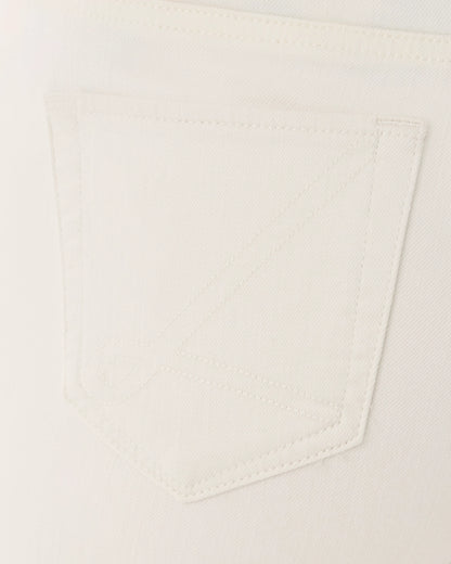 Close-up of a pocket on a light-colored garment