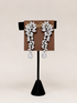 A pair of silver-toned drop earrings with clear gemstones arranged in a floral and vine pattern clip on earrings lordane Cubic Zirconia Drop Formal Earrings
