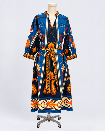Maude Vivante blue and orange floral print cotton midi dress with three-quarter sleeves, V-neckline, and matching tie waist