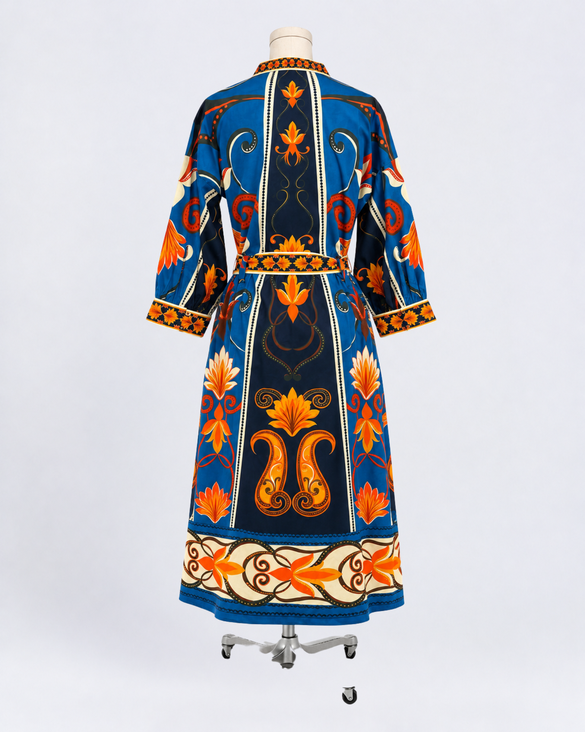 Maude Vivante blue and orange floral print cotton midi dress with three-quarter sleeves, V-neckline, and matching tie waist
