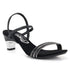 Black sandal with thin straps on a white background