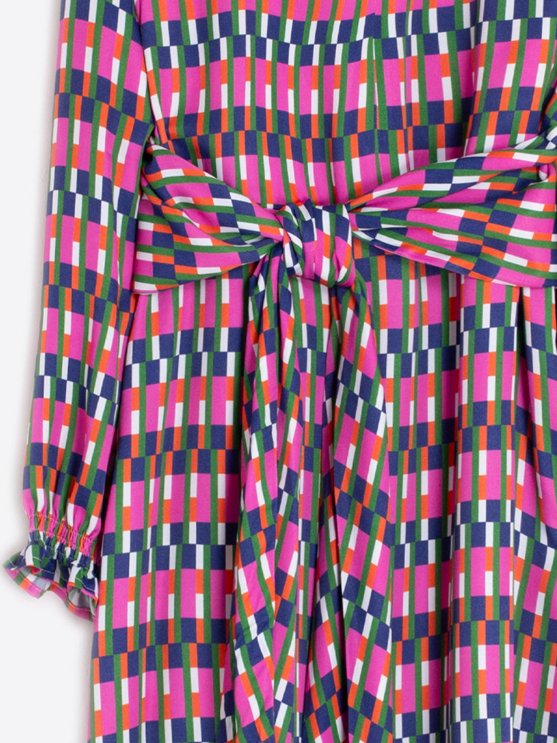 Colorful checkered dress with a tie waist on a white background