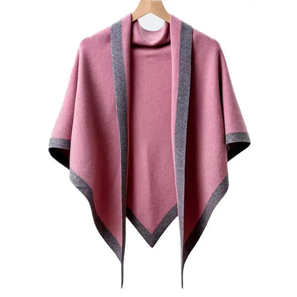 Pink poncho with gray trim on a white background