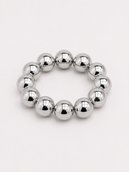 A beaded stretch bracelet made of glossy, round silver beads. Uga, georgia football, university of Georgia game day jewelry. 