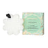 White flower-shaped body wash buffer with packaging on a white background