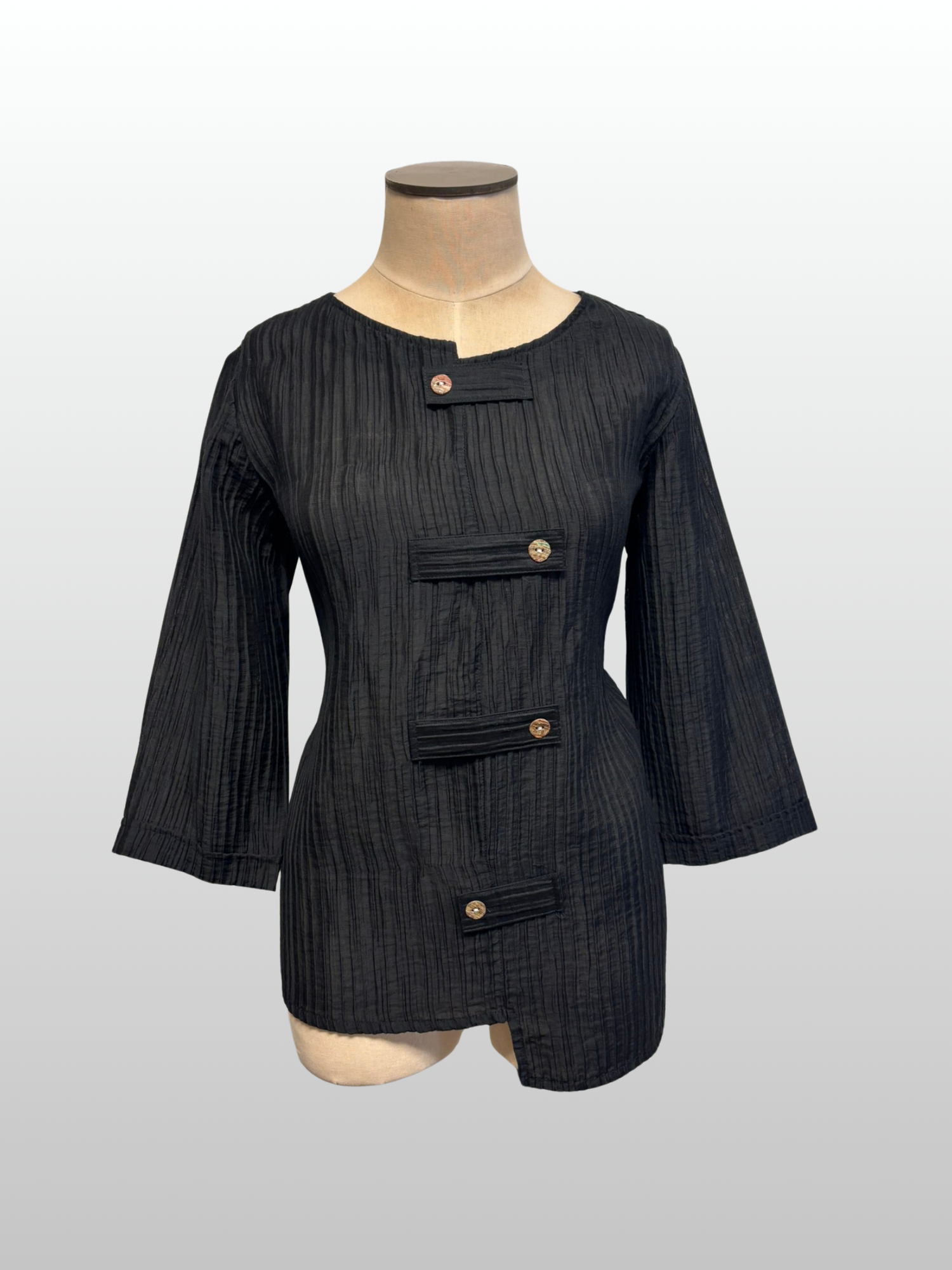 Black pinstripe jacket on a mannequin against a white background