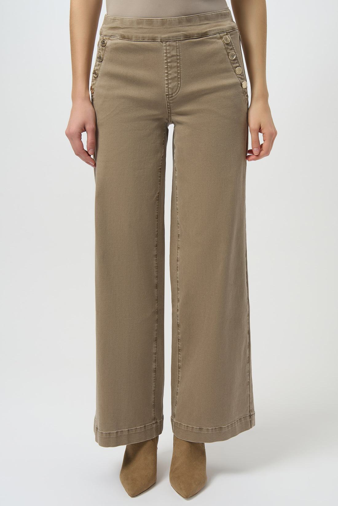 Beige wide-leg pants worn by a person on a white background