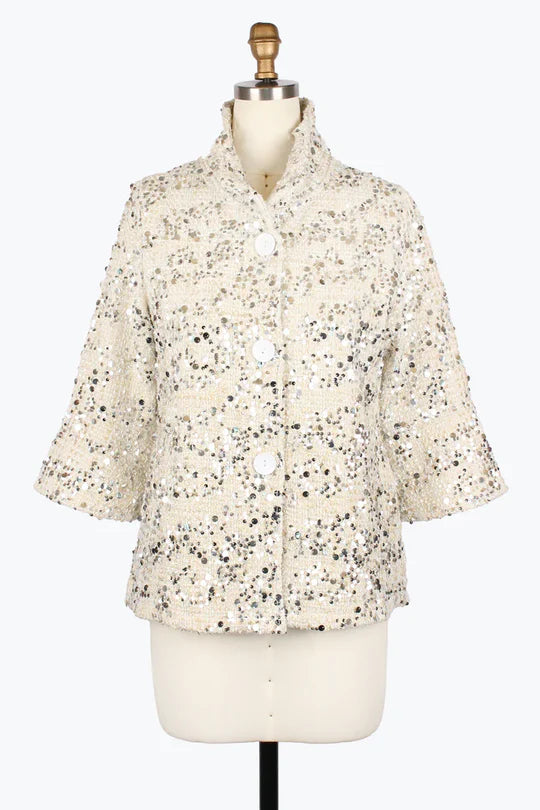 Sequined patterned jacket on a mannequin against a white background