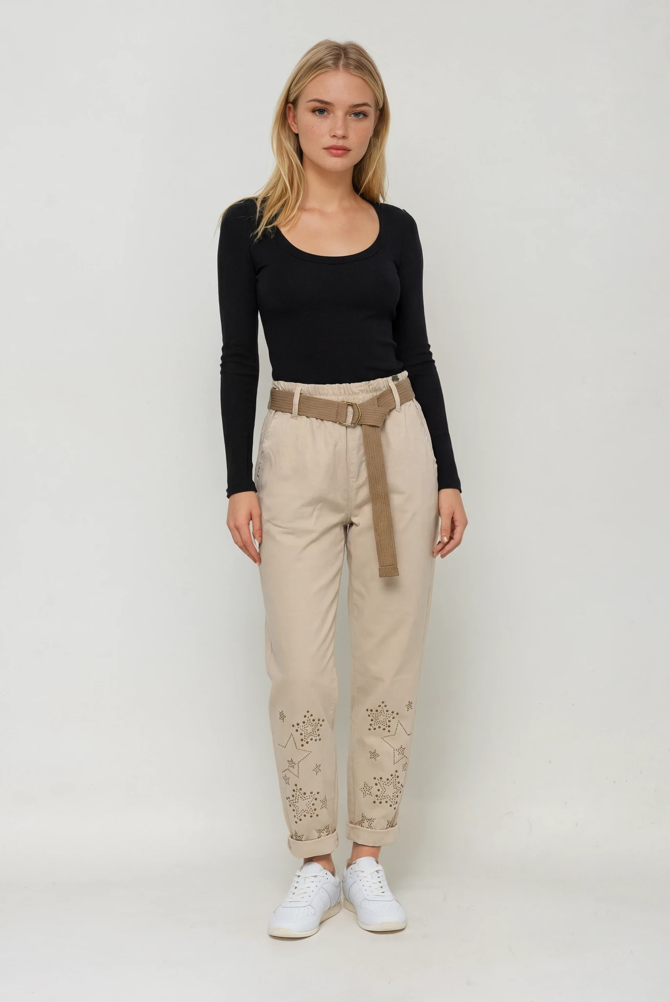 Girls white pants with gold stars at the bottom