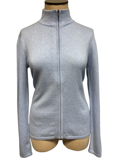 The front of a light sky blue zip-up cardigan on a mannequin against a white background